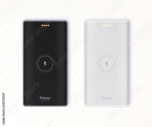 Black and grey wireless powerbanks isolated on white textured background.