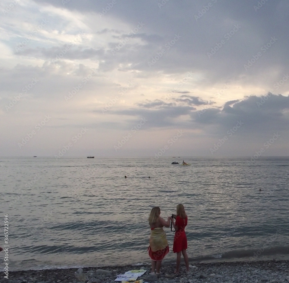 Fototapeta premium Two girls on the beach.