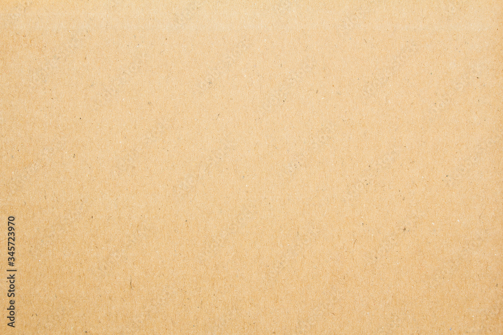 Brown rustic cardboard paper surface texture background. Brown rustic cardboard paper surface texture background.