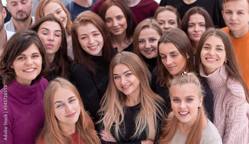 close up. happy young people showing their success