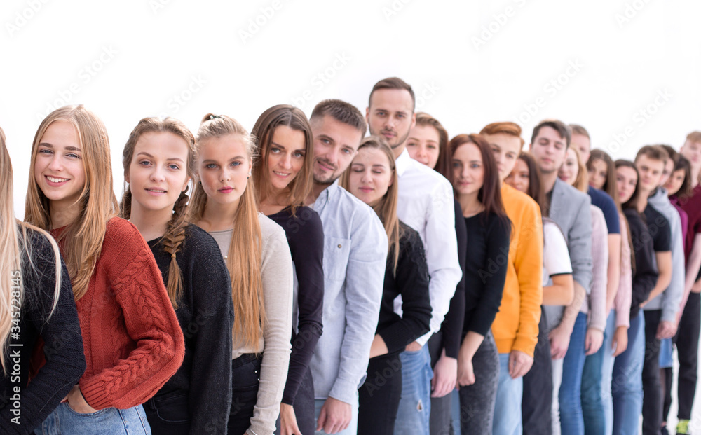 group of diverse young people standing in line.