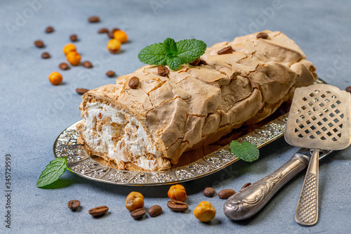 Tableau sur toile Coffee meringue roulade with mascarpone and whipped cream.