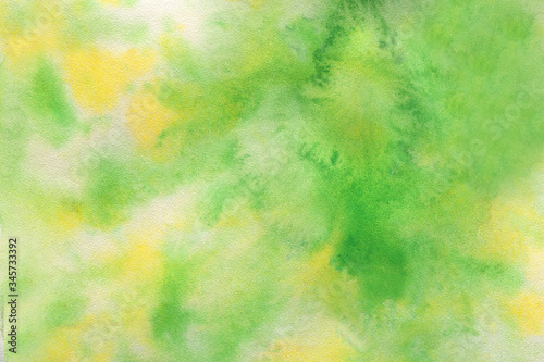 Abstract light color watercolor background. Hand drawn yellow, green, white gradient painting.