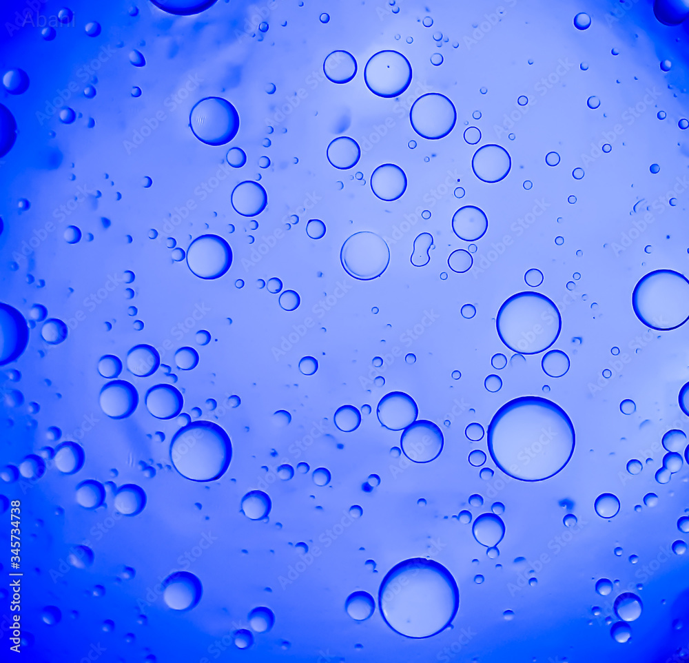 Water bubble on the blue background and lighting.