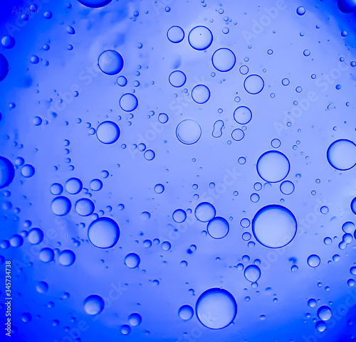Water bubble on the blue background and lighting.