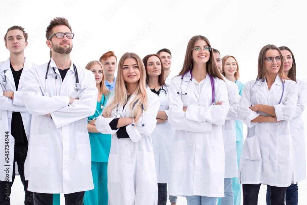 in full growth. doctors and interns standing together. in full growth. doctors and interns standing together.