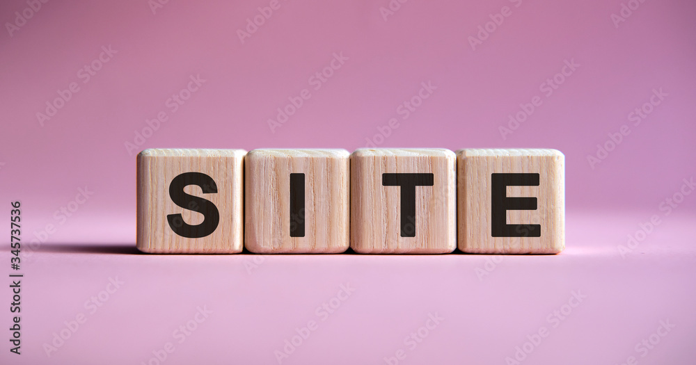Website text on cubes on a pink background Website text on cubes on a pink background