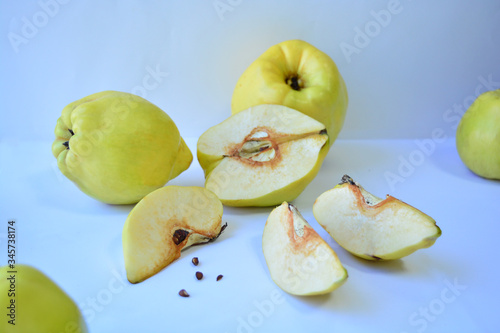 Juicy quince on a white background