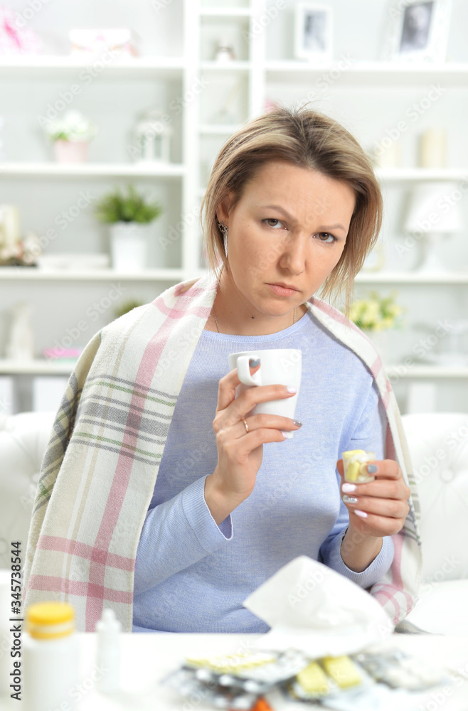 Portrait of beautiful young woman taking pills Portrait of beautiful young woman taking pills