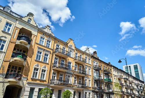 Facades with balconies of historic tenement houses in the city of Poznan 