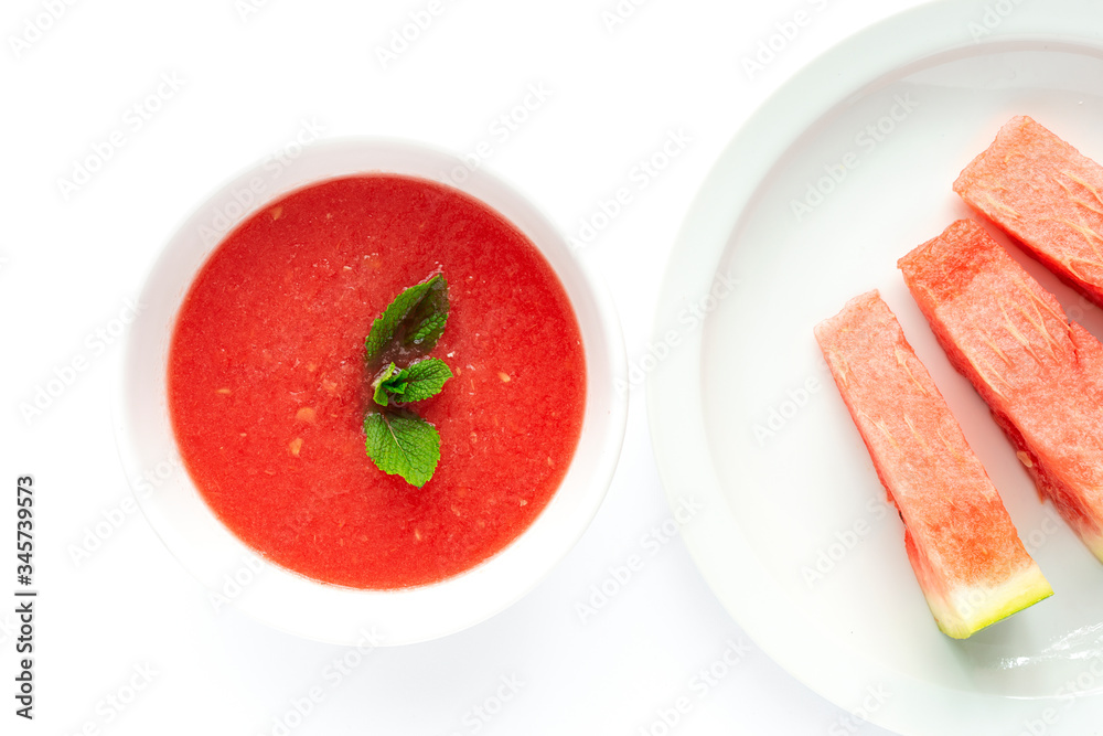 Fresh watermelon mint juice on white background from above Fresh watermelon mint juice on white background from above