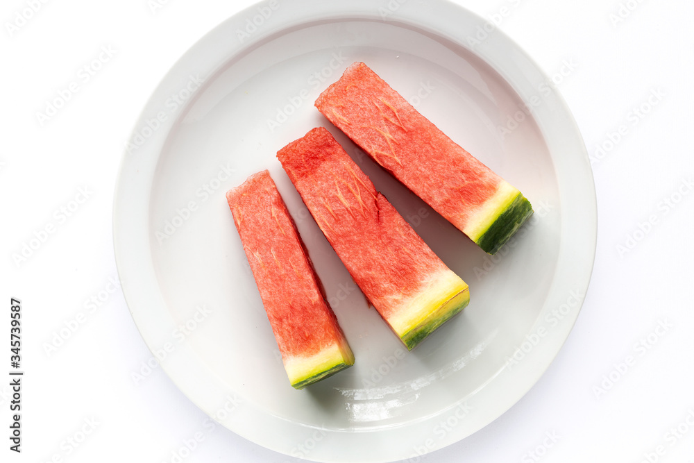 Fresh watermelon on white background from above Fresh watermelon on white background from above