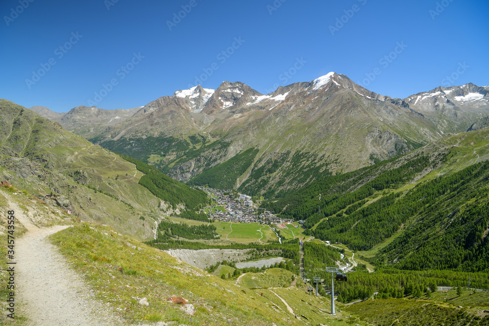 View on Saas-Fee village in Saas valley in southern part of Alps in Switzerland