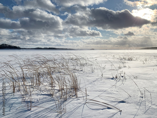 Fototapeta Naklejka Na Ścianę i Meble -  Russia, Chelyabinsk region. Lake Uvildy in sunny January day