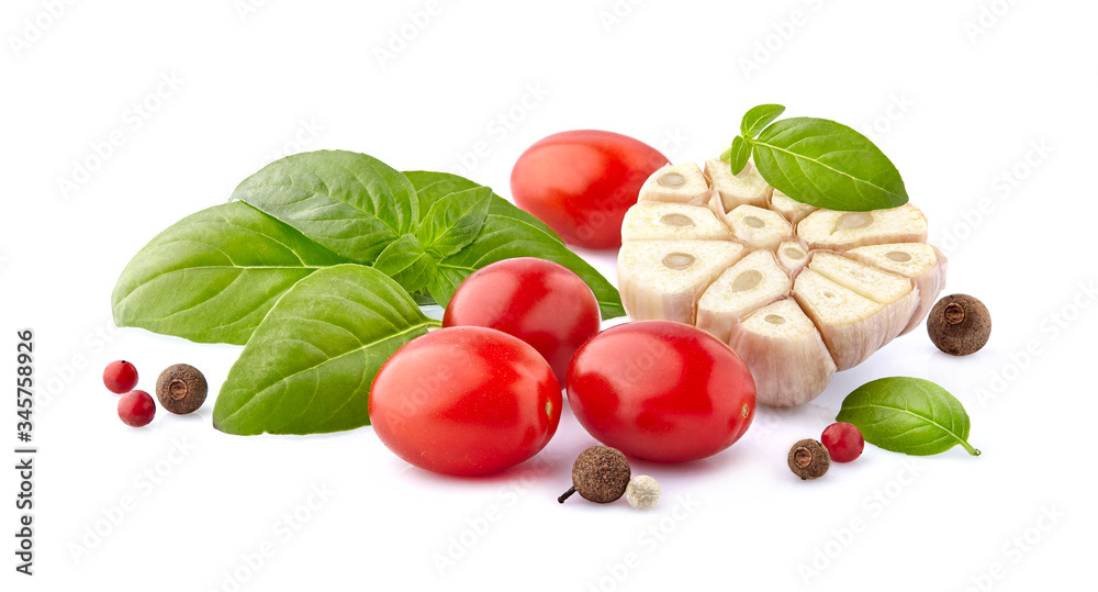 Fresh tomatoes with basil leaves, pepper and garlic isolated on white background. Fresh tomatoes with basil leaves, pepper and garlic isolated on white background.