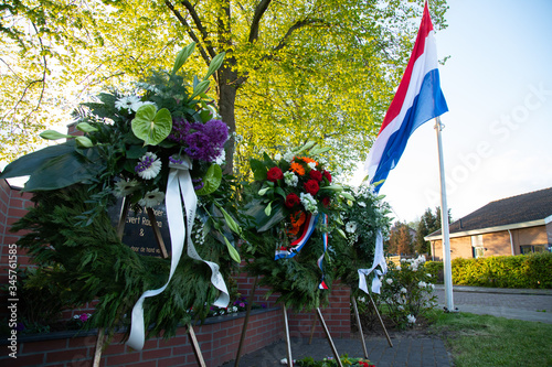 A flower wreath at a World War 2 memorial during a commemoration ceremony on 4 May