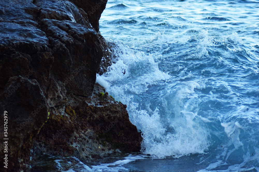 Mediterranean sea water crashing into rocks
Mediterranean sea water crashing into rocks