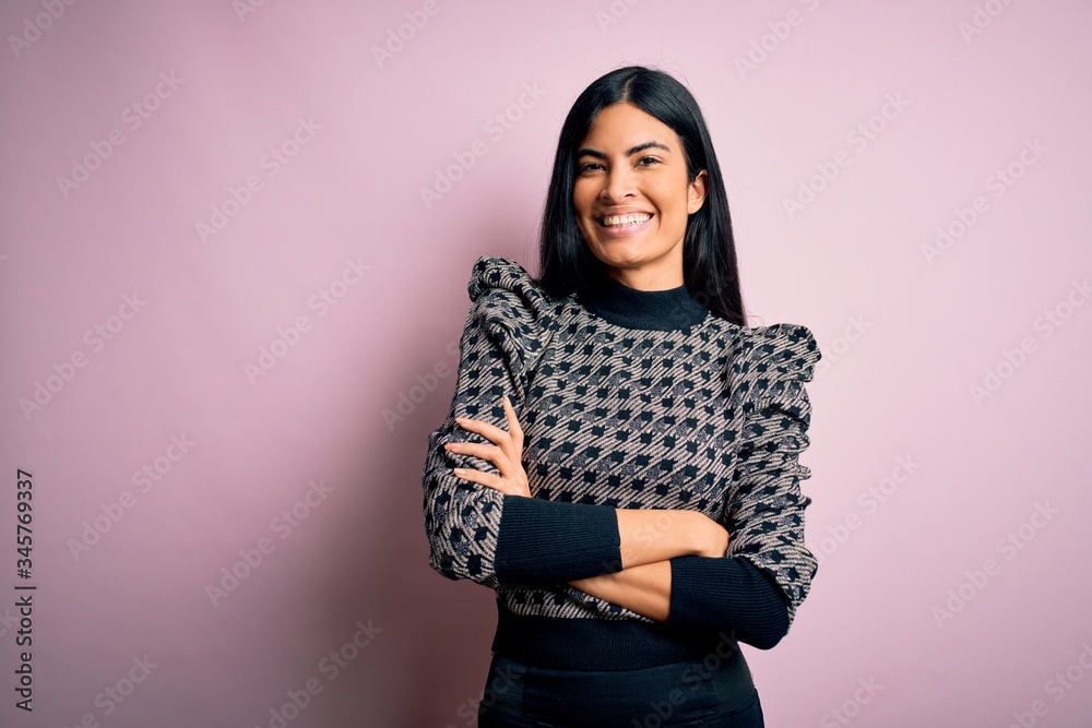 Young beautiful woman wearing fashion urban clothes, model wearing casual street style standing over pink background Young beautiful woman wearing fashion urban clothes, model wearing casual street style standing over pink background