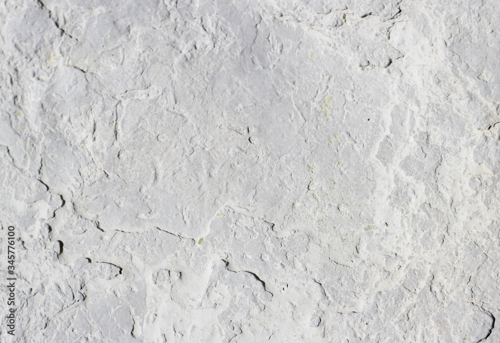abstract texture of coastal white stone for background, close-up