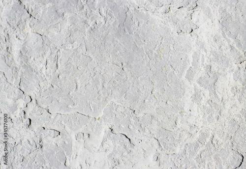 abstract texture of coastal white stone for background, close-up