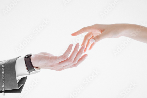 hands of lovers on a white background