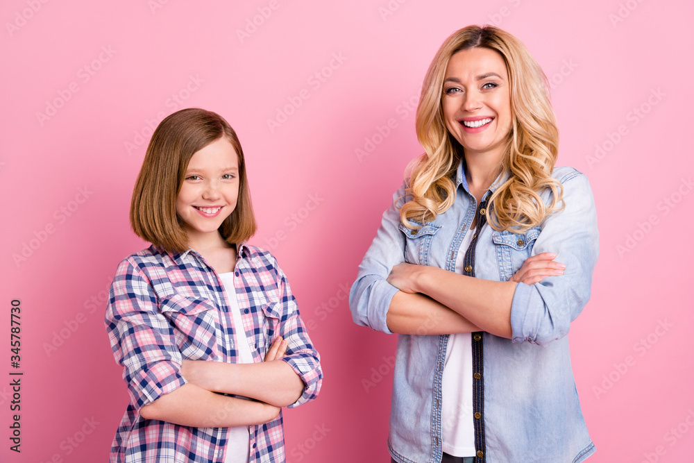 Portrait of work team workers mother daughter cross hands ready solve job decision solution wear casual denim jeans checkered plaid shirt isolated over pastel color background Portrait of work team workers mother daughter cross hands ready solve job decision solution wear casual denim jeans checkered plaid shirt isolated over pastel color background