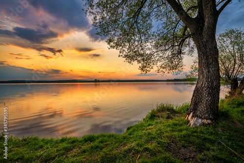 Fototapeta Naklejka Na Ścianę i Meble -  Beautiful summer sunset at lake