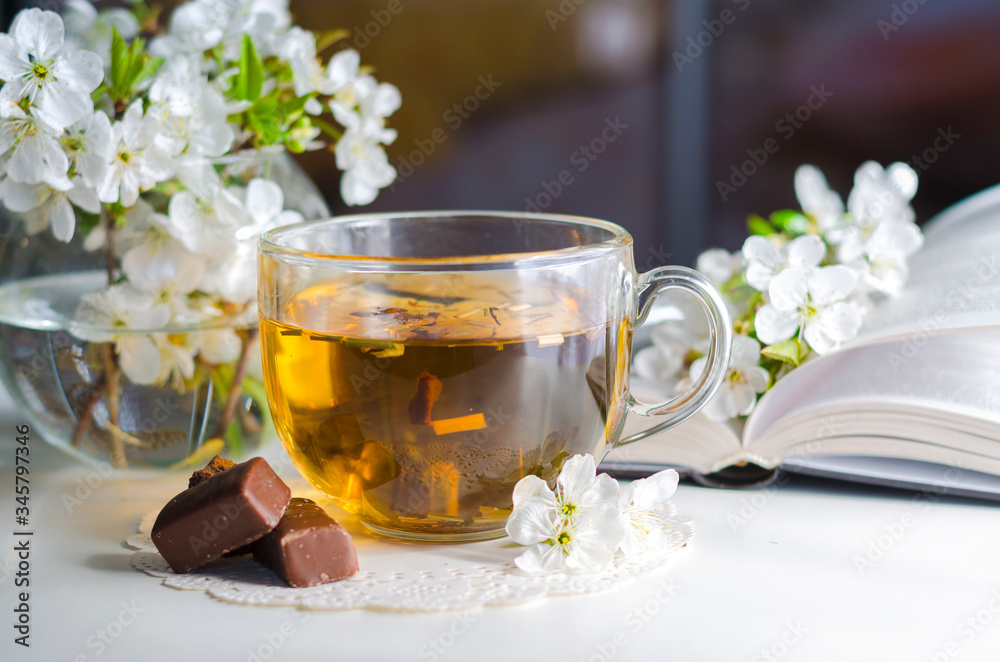 Tea and cherry flowers Tea and cherry flowers