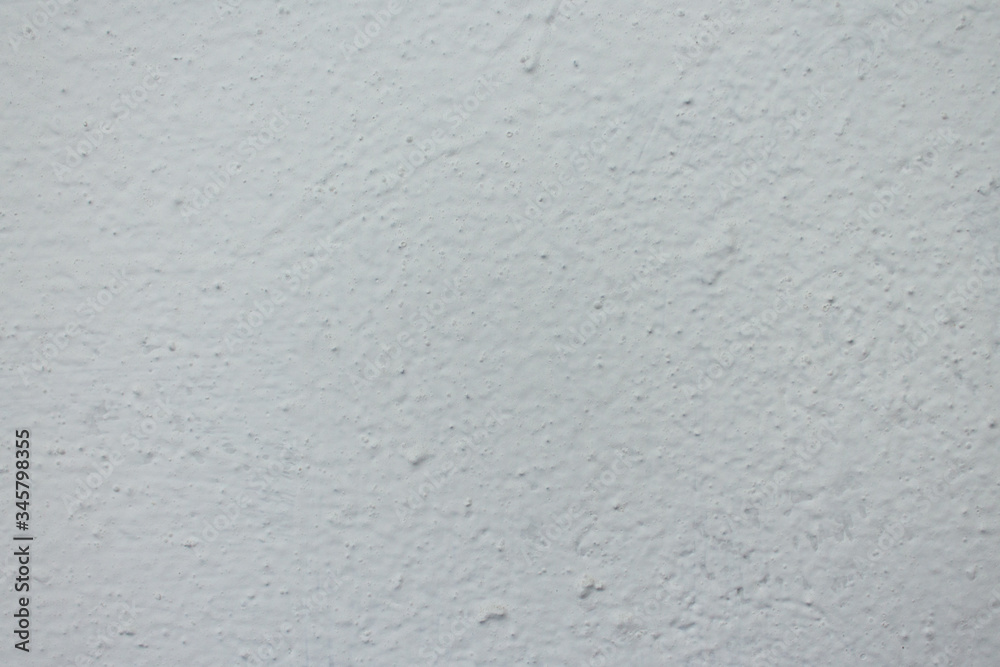 rough white painted wall with bumps texture background rough white painted wall with bumps texture background