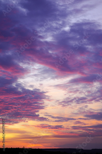 Fototapeta Naklejka Na Ścianę i Meble -  Deep sky above horizon. Bright sunset with clouds