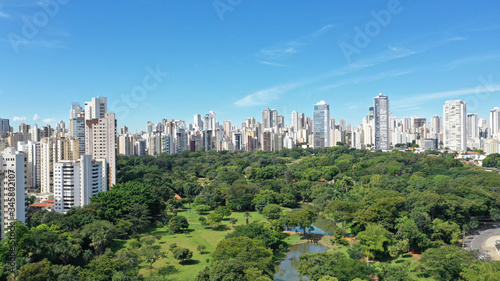 Scenic view of the Zoo in Goiania with several lakes, tropical trees and luxury residential buildings. Goiania, Goias, Brazil 