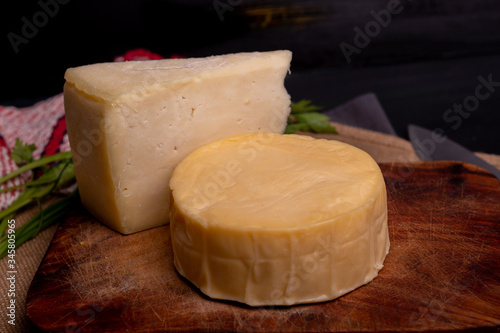 Delicious cheese in a wheel ready to eat or enjoy in an afternoon with friends