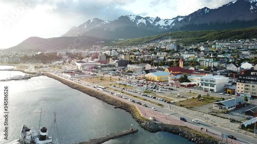 Aerial View of Saint Christopher Shipwreck Near Harbor and Ushuaia Cityscaoe Under Evening Sun photo