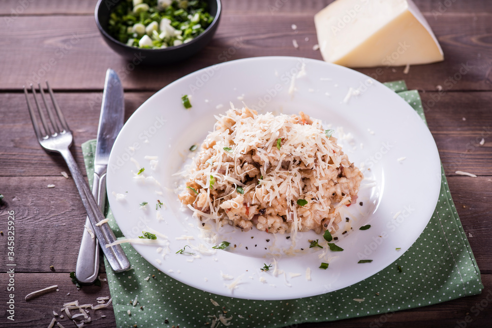 risotto with mushrooms, fresh herbs and parmesan cheese. Tasty and healthy vegetarian lunch risotto with mushrooms, fresh herbs and parmesan cheese. Tasty and healthy vegetarian lunch
