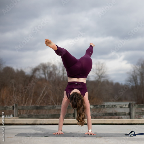 Girl doing yoga in nature 