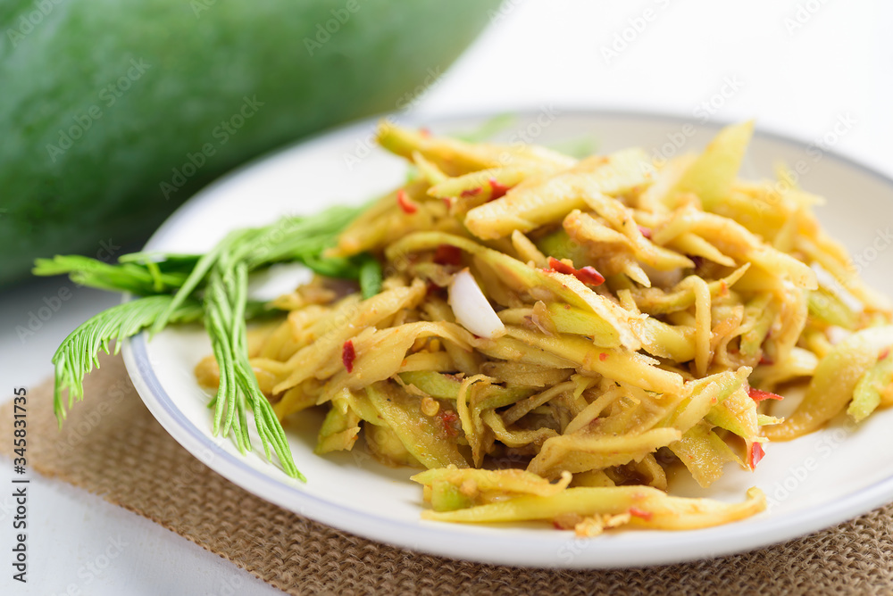Thai food, spicy green mango salad (Tum Ma Muang) Thai food, spicy green mango salad (Tum Ma Muang)