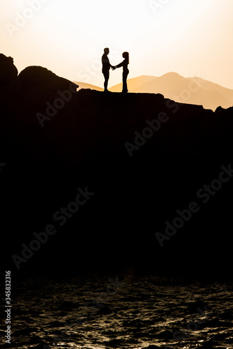 Couple in love hugging in the sunset. Wedding in Majorca by the sea.