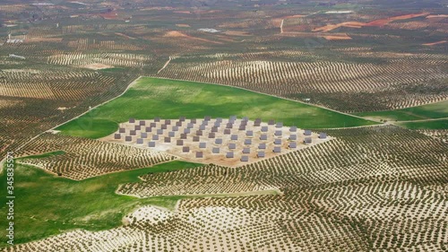 WS AERIAL Photovoltaic plant surrounded by olive orchards