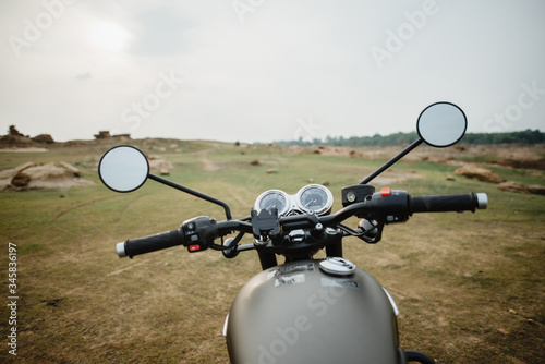 The view over the handlebars of motorcycle