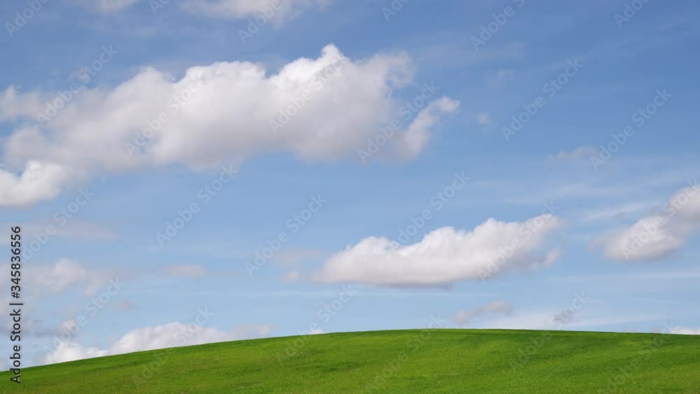 WS Blue sky and clouds over green field WS Blue sky and clouds over green field