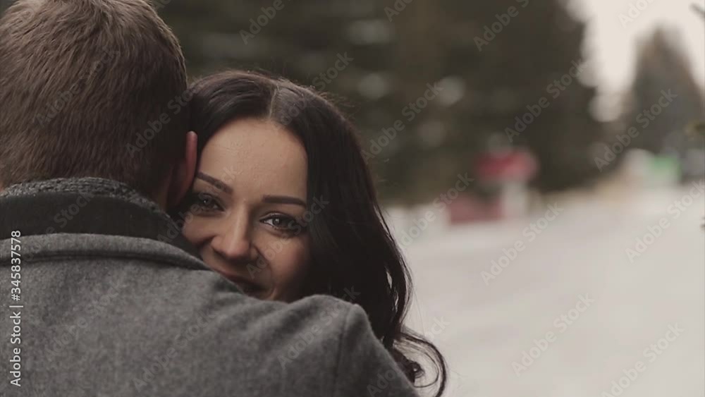 a couple in love hugs. A man and a woman look into each other's eyes. the bride and groom kiss on Valentine's day. February 14 a couple in love hugs. A man and a woman look into each other's eyes. the bride and groom kiss on Valentine's day. February 14