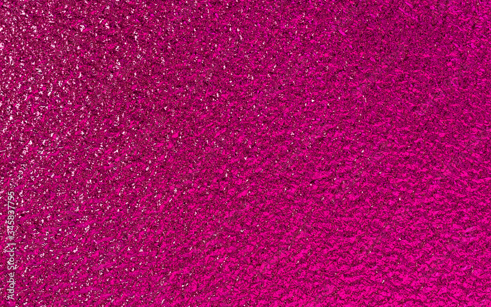 Pink metallic foil paper texture background.