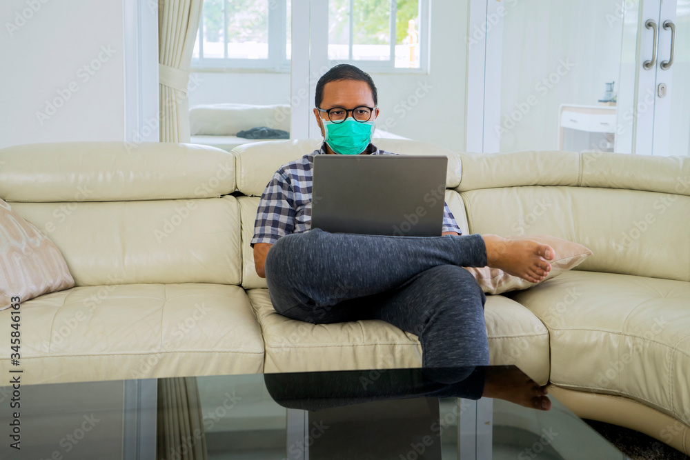 Businessman working at home with laptop Businessman working at home with laptop