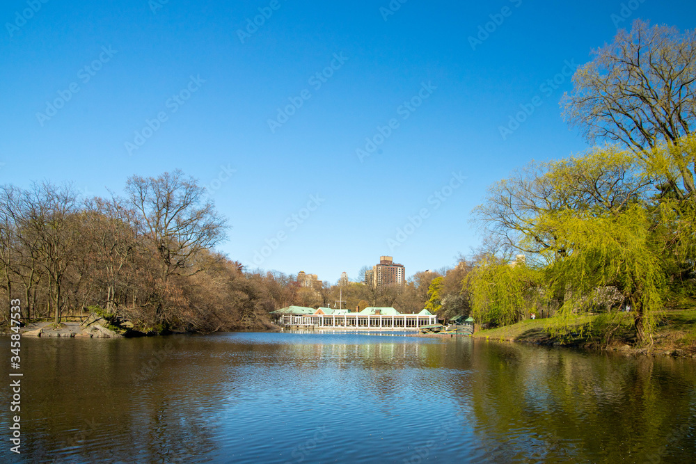 Boat house and lake in Central Park , New York 