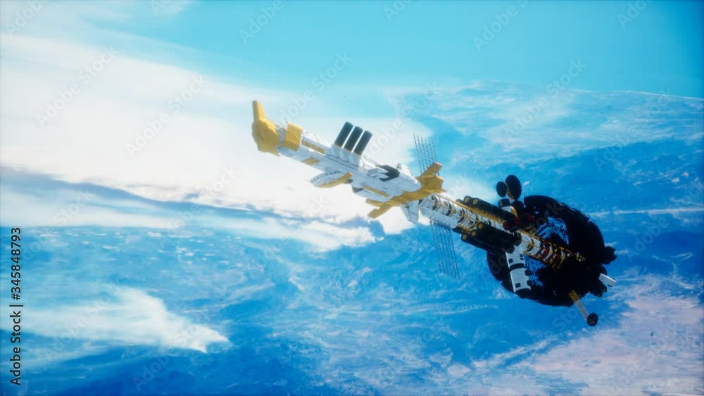 futuristic spaceship near the Earth. Elements of this image furnished by NASA futuristic spaceship near the Earth. Elements of this image furnished by NASA