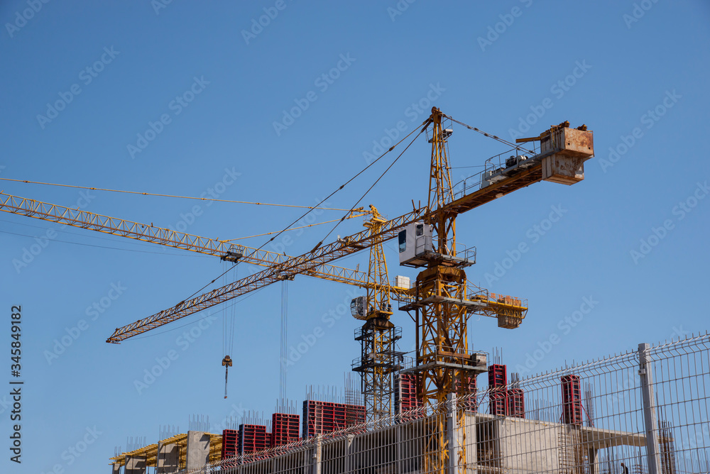 Crane on the construction of a high-rise building .
