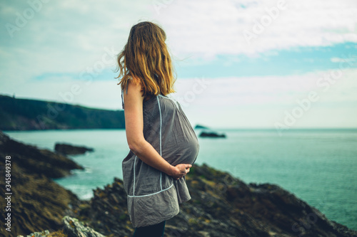 Pregnant woman by the seaside