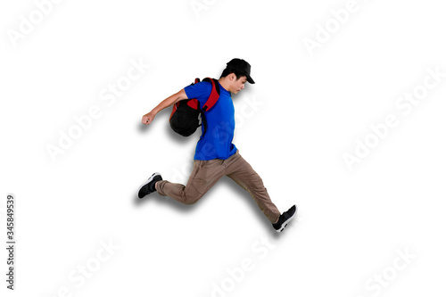College student jumping with white background