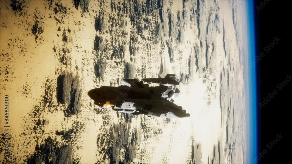 futuristic spaceship near the Earth. Elements of this image furnished by NASA futuristic spaceship near the Earth. Elements of this image furnished by NASA