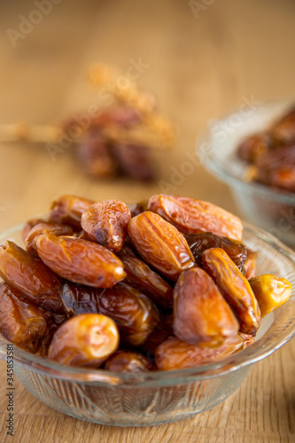 Kurma or dates on wooden background